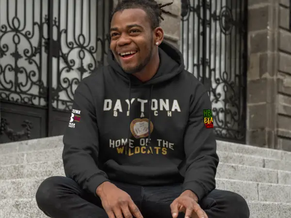 Smiling man wearing a Black - Daytona Beach - Bethune Cookman - HBCU - Fleece Hoodie