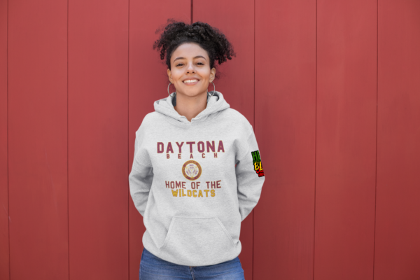 Smiling woman wearing a Light Gray - Daytona Beach - Bethune Cookman - HBCU - Fleece Hoodie