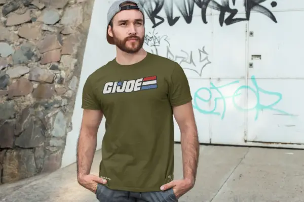 Man with hat backwards wearing a Olive - G.IJoe Retro Cartoon Triblend T-Shirt