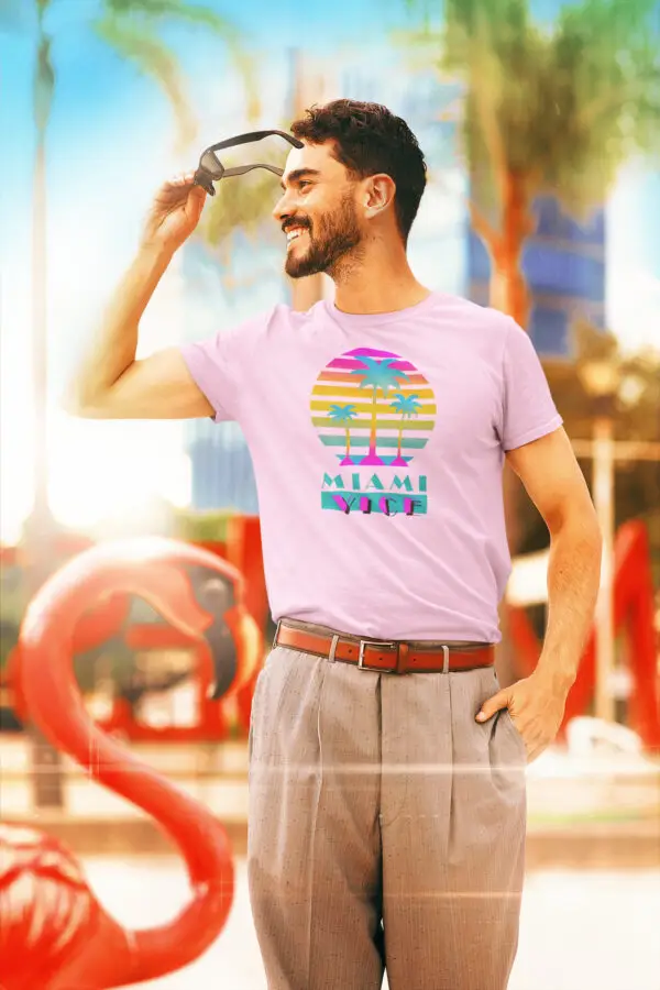 Man with shades wearing a Pink - Miami Vice (Palm Tree) Retro Triblend T-Shirt