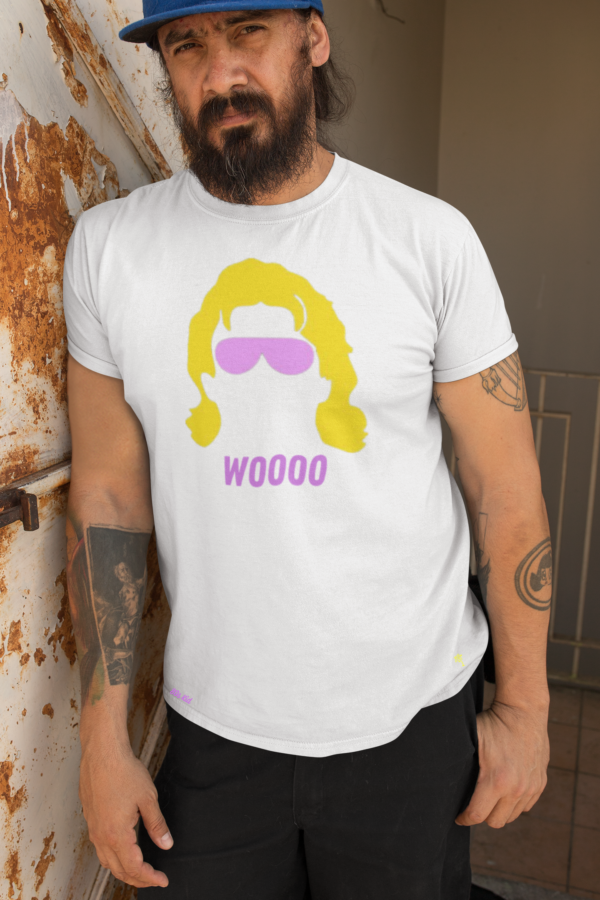 Older man with beard wearing white Ric Flair Woooo t-shirt