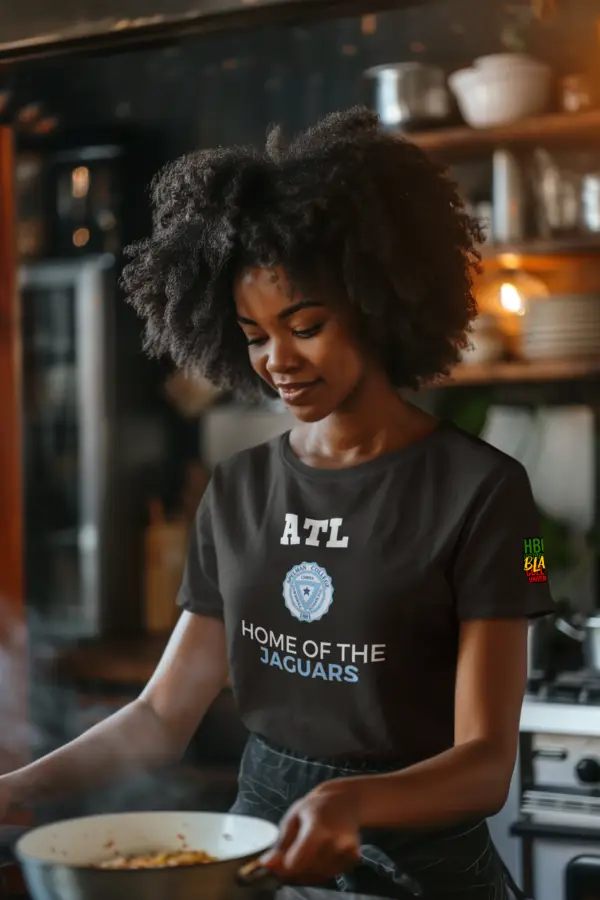 Woman cooking wearing a Black - HBCU Spelman College Jaguars - ATL - Triblend T-Shirt