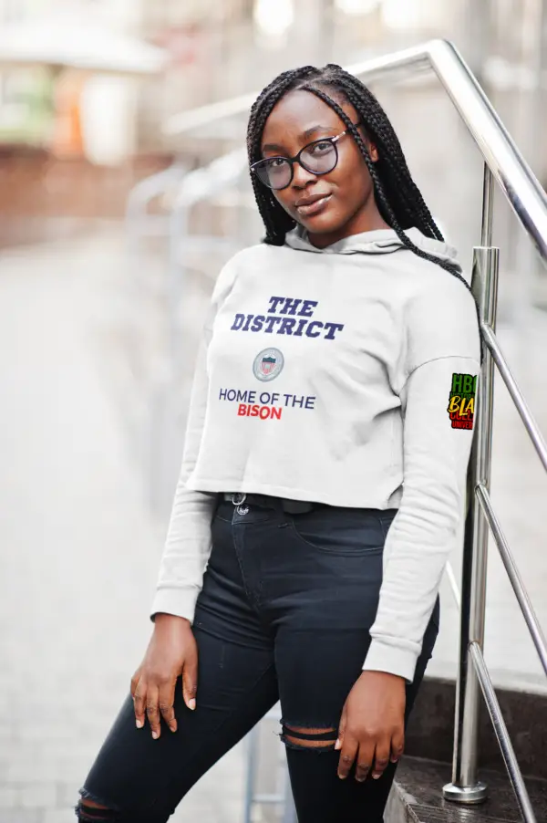 Woman with glasses wearing a White - Howard University - The District - Crop Fleece Hoodie