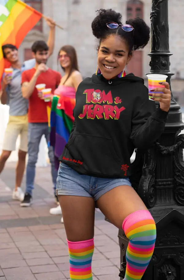 Young woman wearing a Black Tom & Jerry Fleece Hoodie