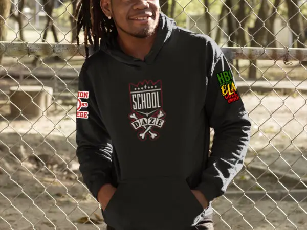 Man wearing a black School Daze Mission College Fleece Hoodie