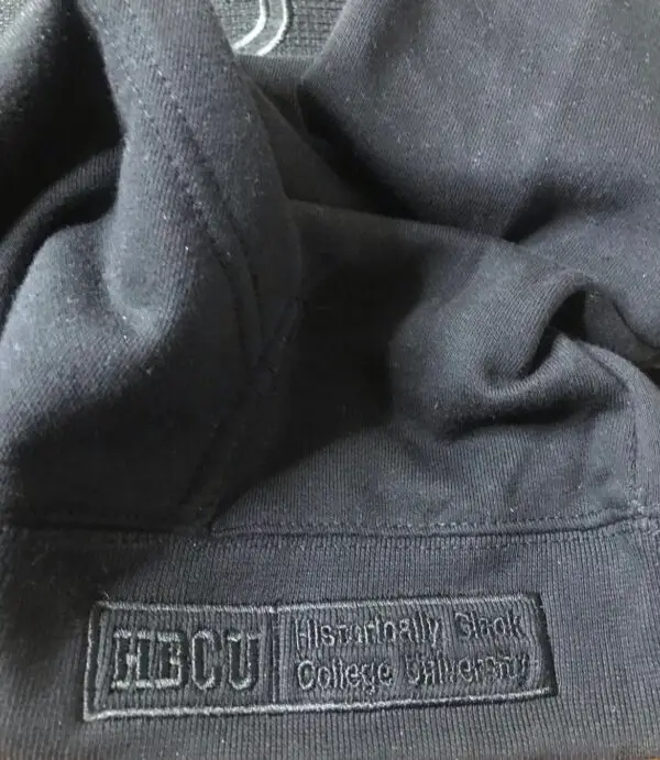 Blackout -Jackson State University Embroidered Fleece Hoodie - highlighting the "HBCU" embroidered wording.