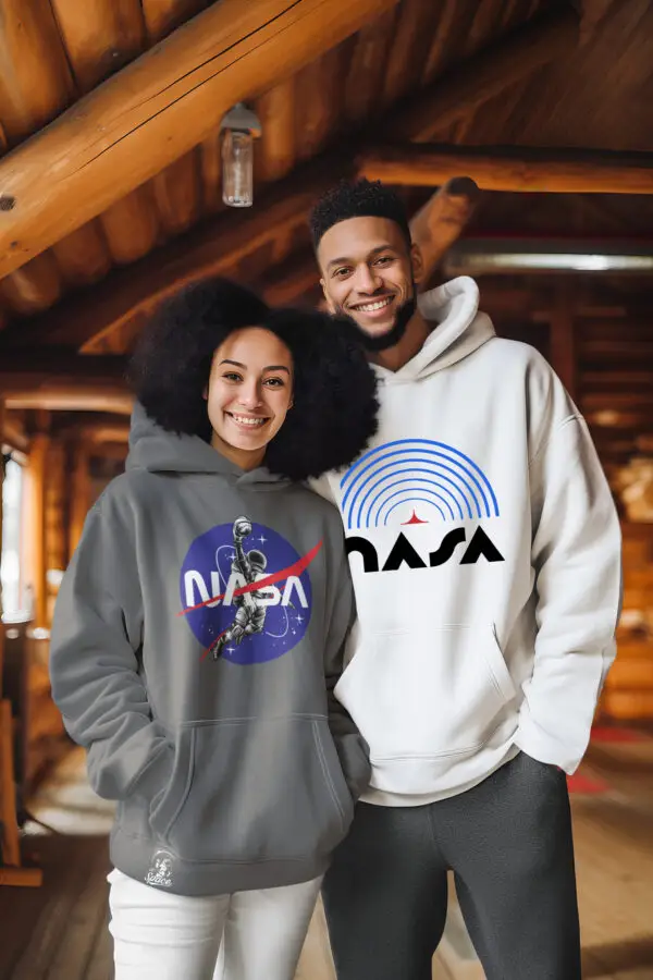 Young man and woman wearing a gray and white - NASA Moon Man Basketball Astronaut Fleece Hoodie