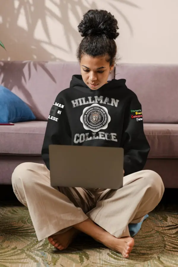 Young woman wearing a Black/White Hillman College Replica Fleece Hoodie