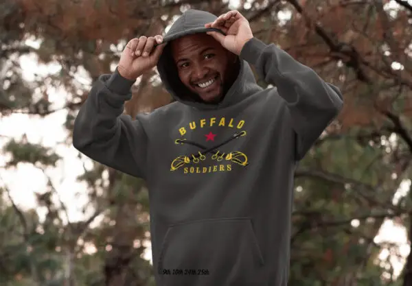 Man wearing a gray Buffalo Soldiers Cavalry Fleece Hoodie