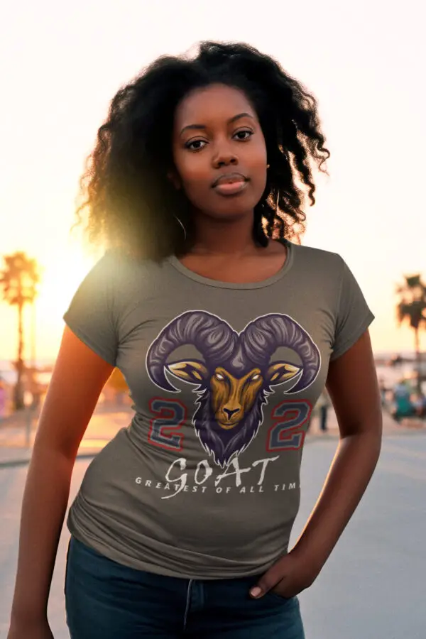 Woman wearing a gray - GOAT - Basketball Legend Sheryl Swoopes tee