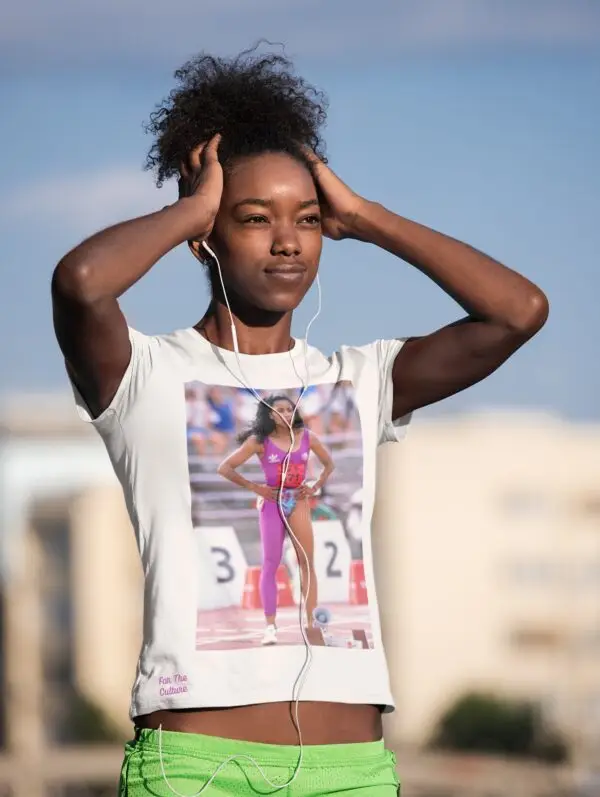 Woman wearing a White - Flojo - Florence Griffith Joyner cropped tee