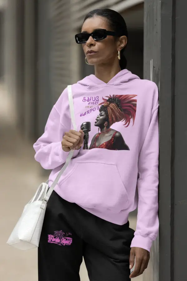 Woman wearing a pink - Shug Avery at Harpo's (The Color Purple Movie) Fleece Hoodie